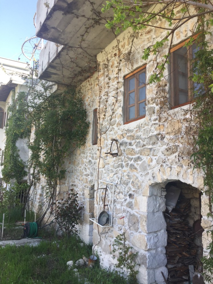The old outside wall of the hostel is stone cobbled and beautiful with ivy climbing and flowers growing