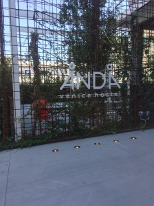 Anda Venice hostel entrance sign. Modern Art Deco